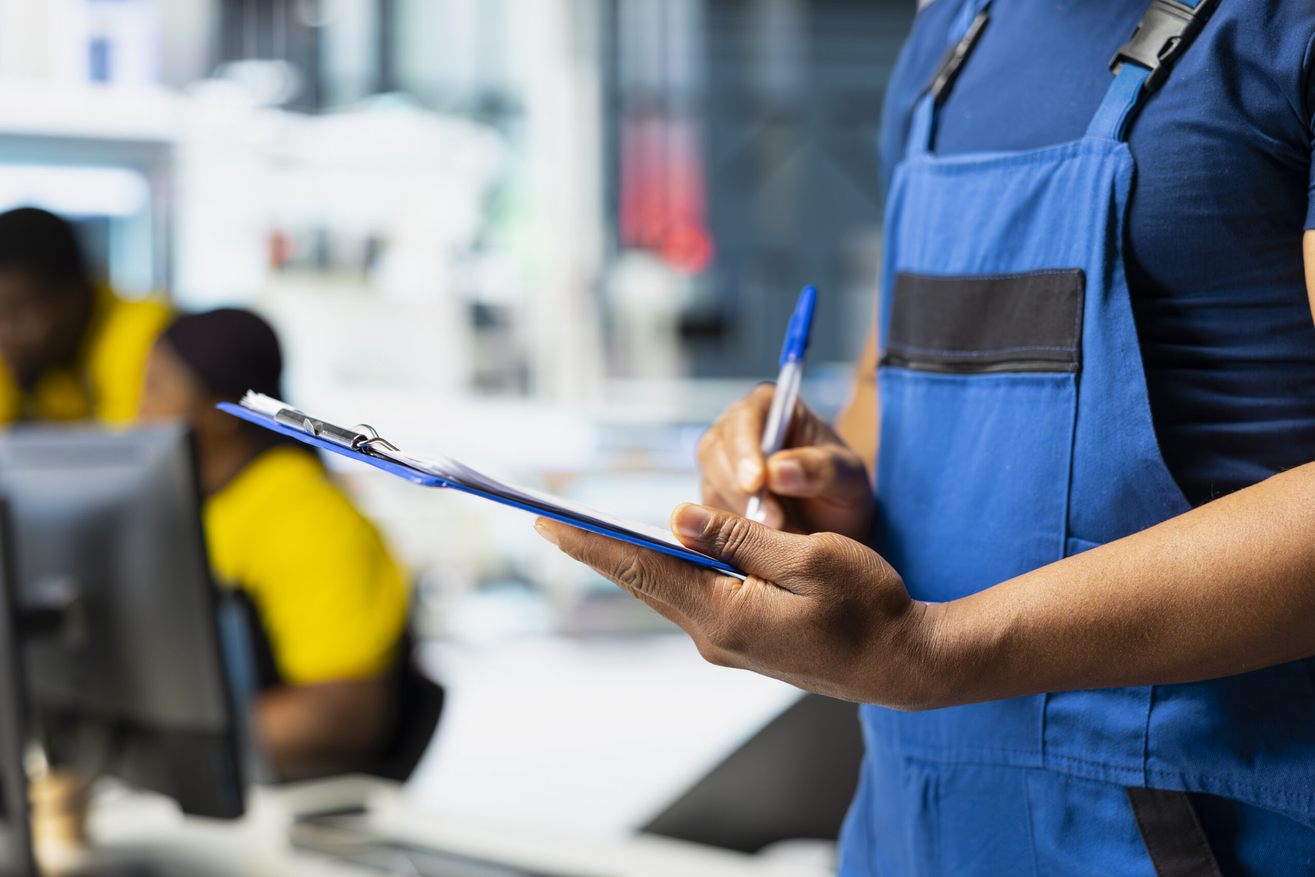 technician investigating malfunctioning systems in photovoltaics factory